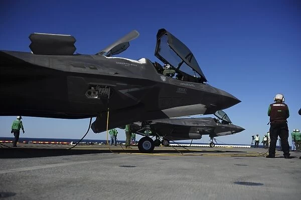 F-35B Lightning II variants are secured on the flight deck of USS Wasp