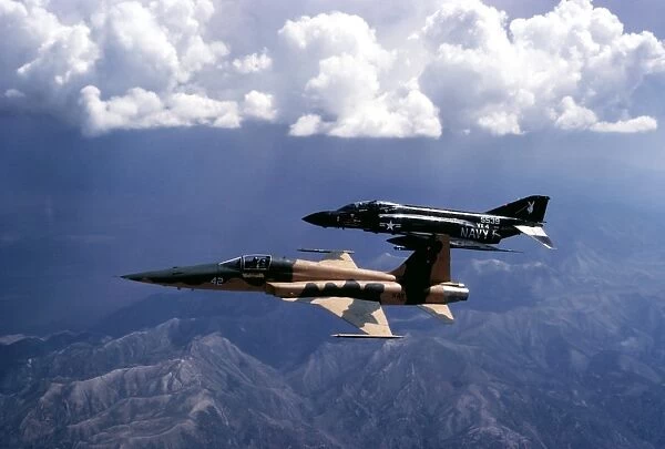 An F-5 Tiger II and F-4 Phantom II during a tactics development flight