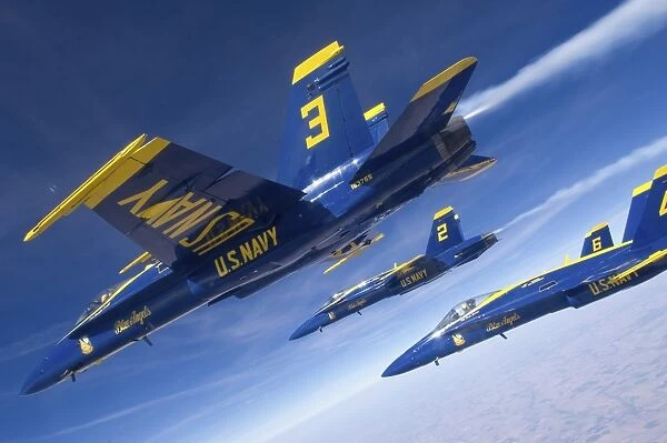 F  /  A-18 Hornets of the Blue Angels fly in formation over Colorado