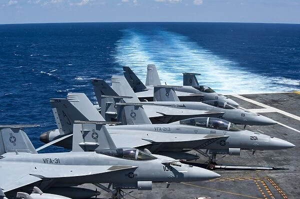F  /  A-18 Super Hornets on the flight deck of USS George H. W. Bush