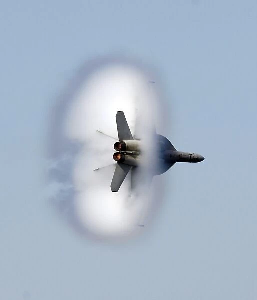 An F  /  A-18F Super Hornet completes a super-sonic flyby