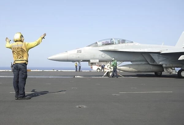 An F  /  A-18F Super Hornet prepares to launch