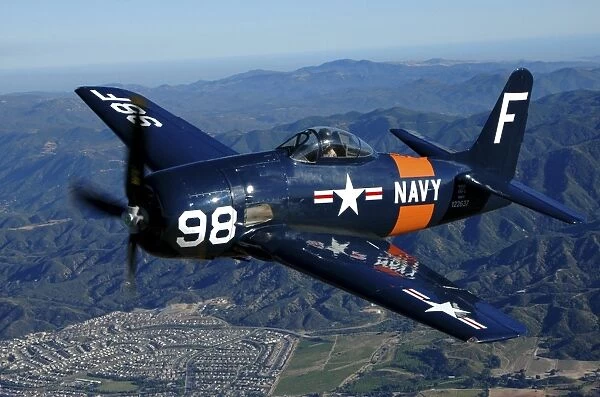 An F8F Bearcat flying over Chino, California