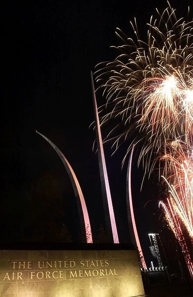 Fireworks light up the Air Force Memorial at Arlington, Virginia