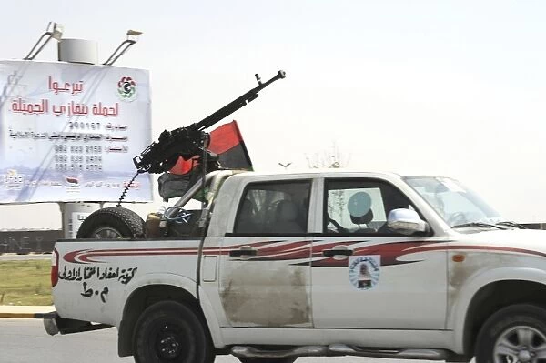 A Free Libyan Army pickup truck with a ZPU a gun in Ajdabiyah, Libya