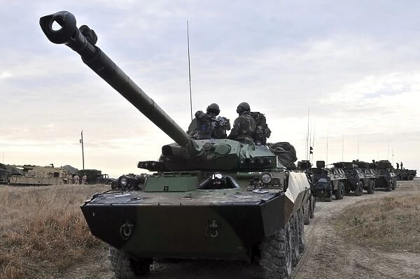 French Marines lead a convoy of combat vehicles during Exercise Bold Alligator 2012