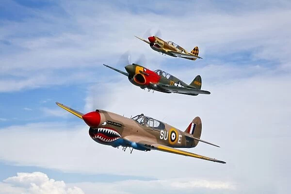 A group of P-40 Warhawks fly in formation near Nampa, Idaho