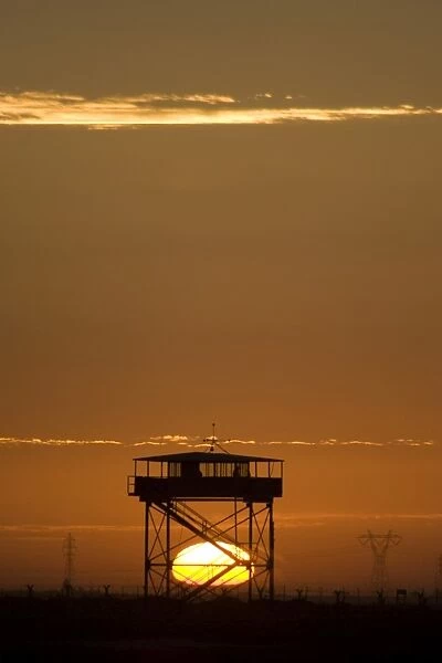Guard tower at sunset