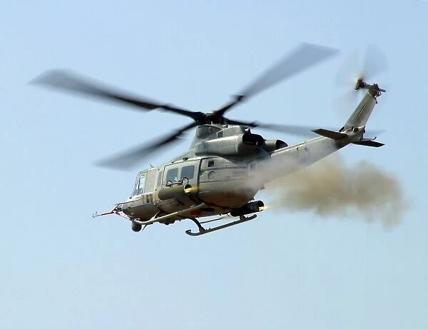 H-1 Upgrades Test Pilot, launches a pair of 2. 75 inch rockets from UH-1Y