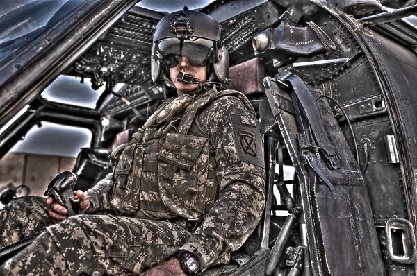 HDR image of a pilot sitting in the cockpit of a UH-60 Black Hawk
