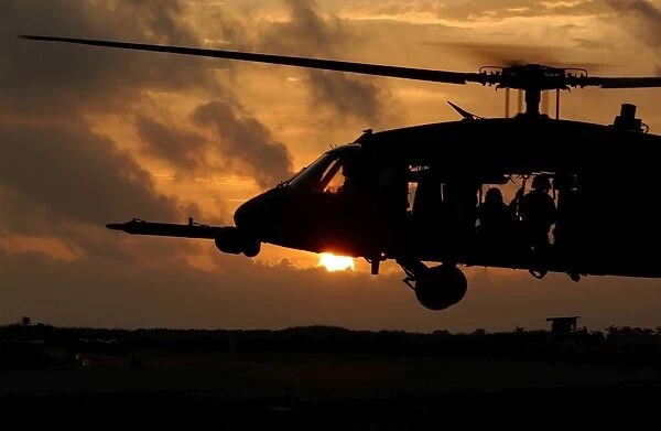 An HH-60G Pave Hawk helicopter prepares to land
