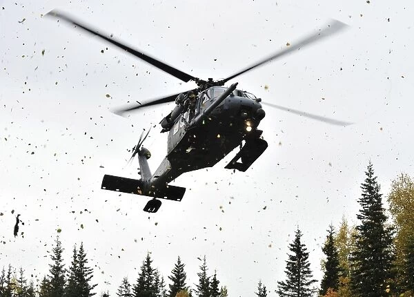An HH-60G Pave Hawk helicopter prepares for landing