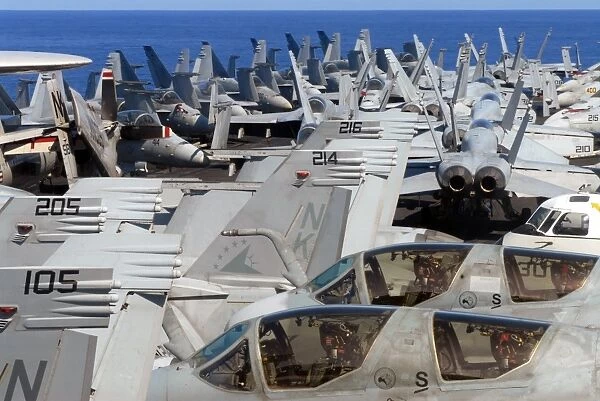ircraft are stacked on the bow of USS Ronald Reagan