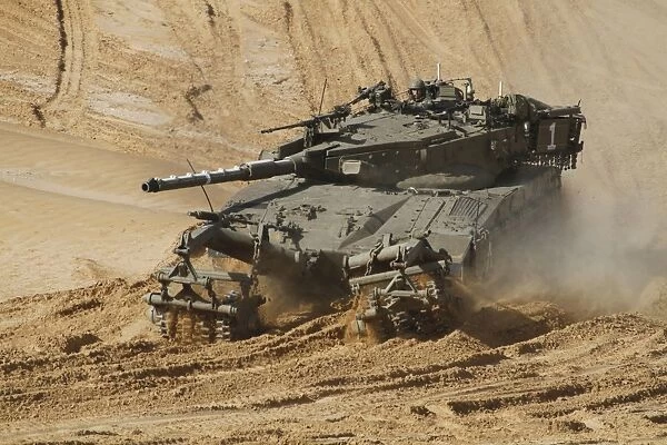 An Israel Defense Force Merkava Mark II battle tank with mine clearing device
