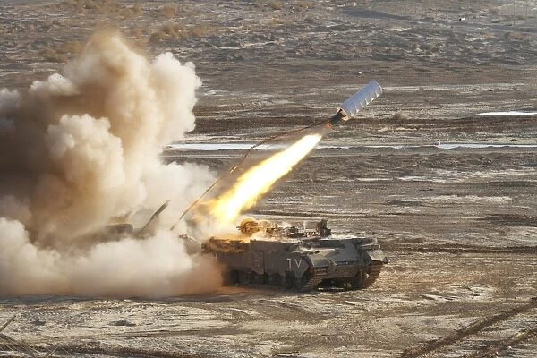 An Israel Defense Force Puma M26 launches a mine clearing line charge