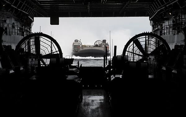 Landing Craft Air Cushion approaches the well deck of USS San Antonio