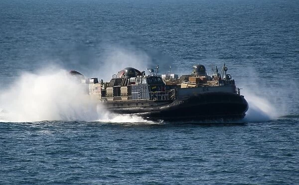 A landing craft air cushion transits the Arabian Gulf