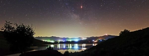 Lunar eclipse and Milky Way above Taleqan Lake, Iran