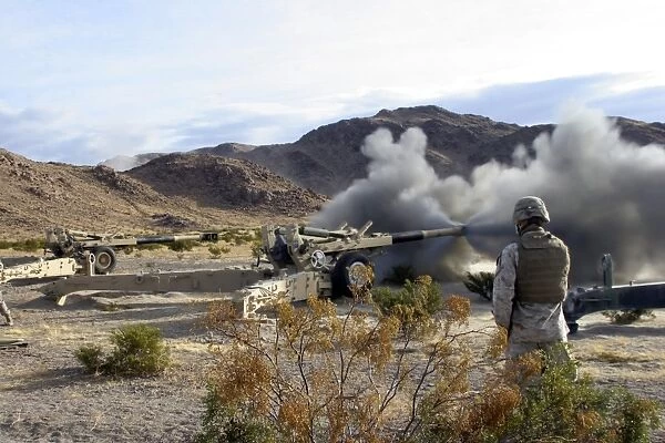 An M198 Howitzer fires a 155-millimeter rocket assisted projectile