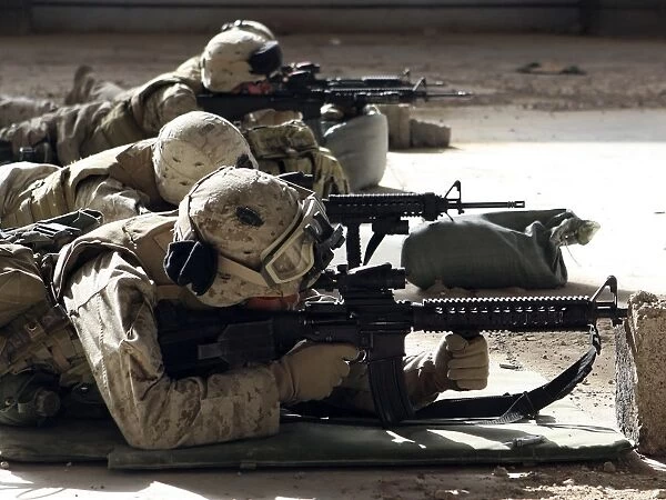 Marines fire their M-16A4 service rifles