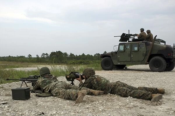 Marines provide support fire on targets with. 50 caliber rifles