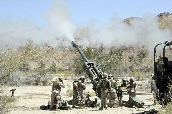 Marines shoot 100-pound rounds from their M777 Lightweight Howitzer