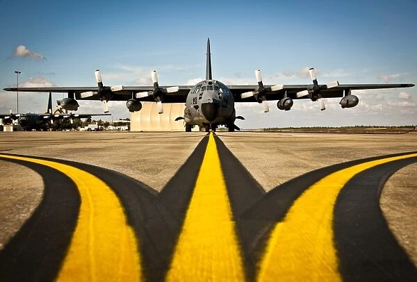A MC-130E Combat Talon I awaits its next mission on the flightline