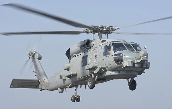 An MH-60R Seahawk in flight over the Persian Gulf