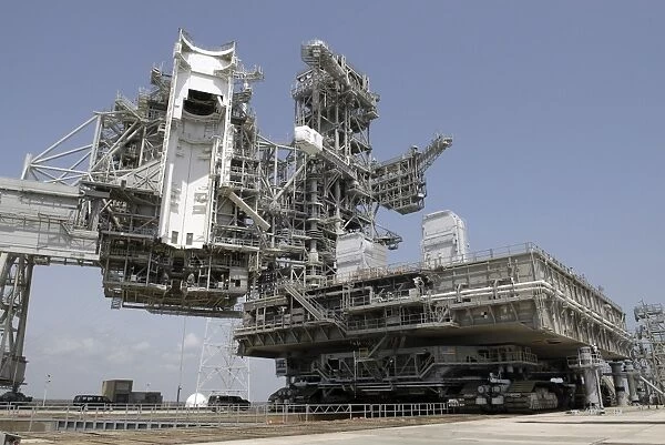 The mobile launcher platform is being moved via the crawler-transporter underneath