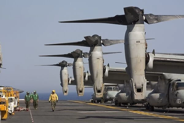MV-22 Ospreys sit ready for launch on the flight deck of USS Kearsarge