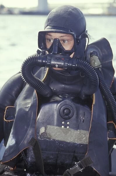 Navy SEAL combat swimmer wearing a closed circuit rebreather
