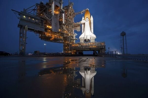 Night view of space shuttle Atlantis on the launch pad at Kennedy Space Center, Florida