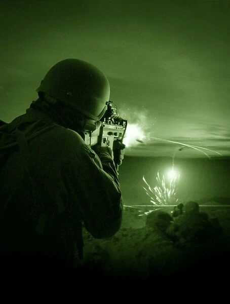 Night vision view of a special operations forces soldier firing his weapon during combat