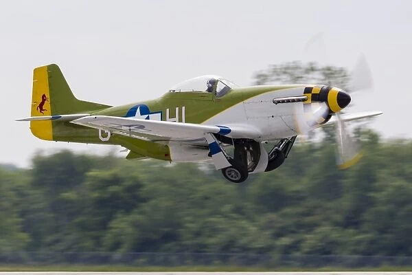 A P-51 Mustang takes off from Mount Comfort, Indiana