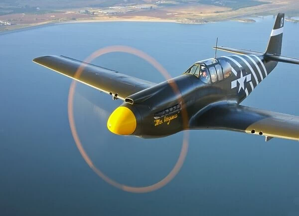 A P-51A Mustang in flight