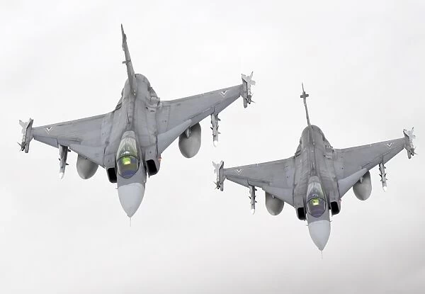 A pair of Hungarian Air Force JAS-39 Gripen over Lithuania