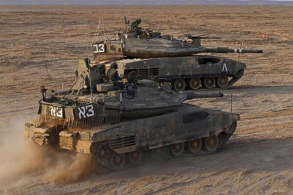 A pair of Israel Defense Force Merkava Mark IV main battle tanks