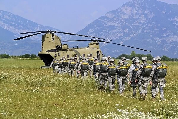 Paratroopers participate in a training jump with a CH-47 Chinook
