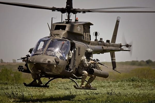 Pilots participate in a military exercise at Fort Riley, Kansas