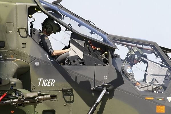 Pilots prepare for a mission in the Tiger Eurocopter of the Germany Army