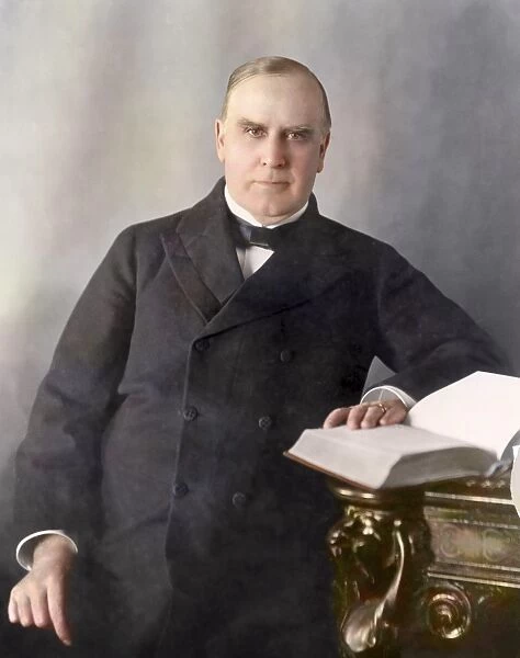 President William McKinley seated at desk, circa 1900