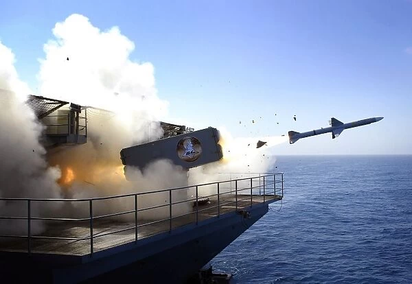 A RIM-7 Sea Sparrow missile launches from USS Abraham Lincoln