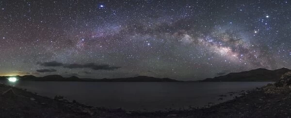 The rising arc of the Milky Way above Yamdrok Lake, Tibet, China