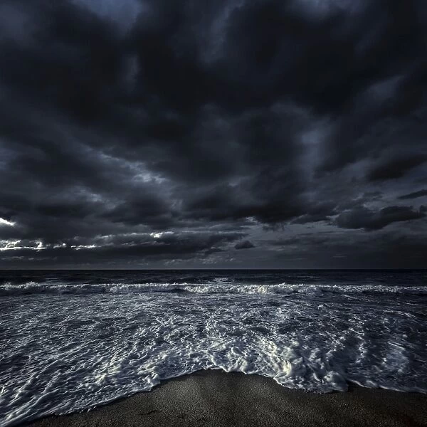 Rough seaside against stormy clouds, Hersonissos, Crete, Greece