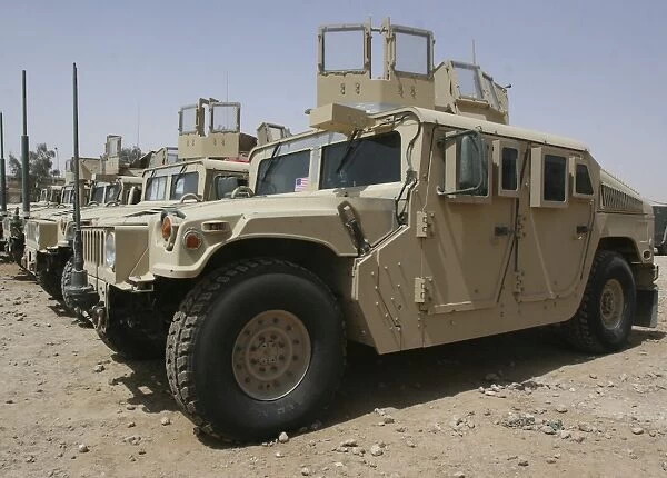 A row of humvees from Task Force Military Police