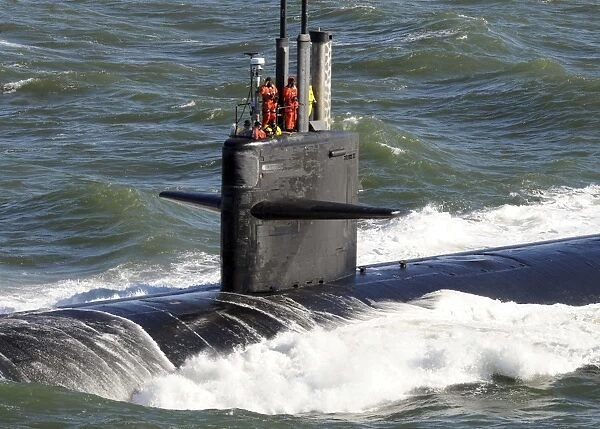 Sailors aboard the attack submarine USS Newport News