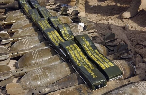 Scattered artillery assigned to Explosive Ordnance Disposal (EOD) in Al Faw, Iraq