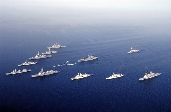 Ships and Rigid Hull Inflatable Boats assemble in formation