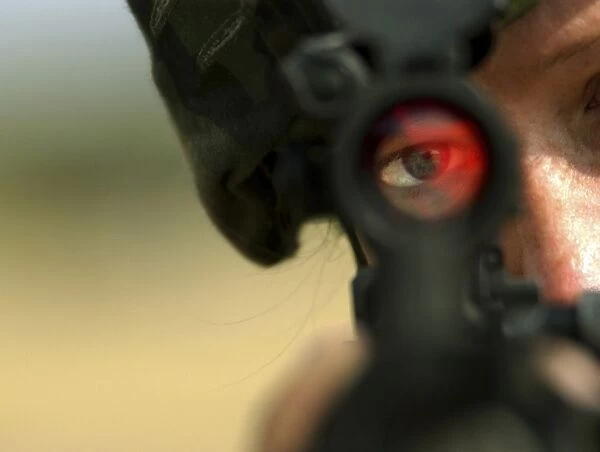 Soldier sights in on pop up targets