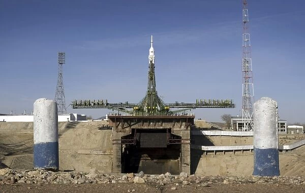The Soyuz rocket is erected into position at the launch pad at the Baikonur Cosmodrome